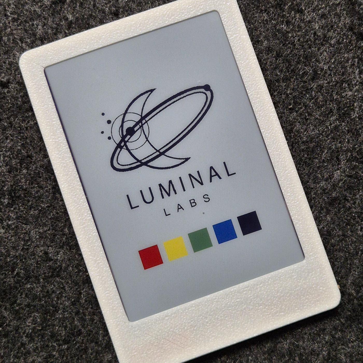 Still showing the Luminal Labs mark above a strip of its five colour inks